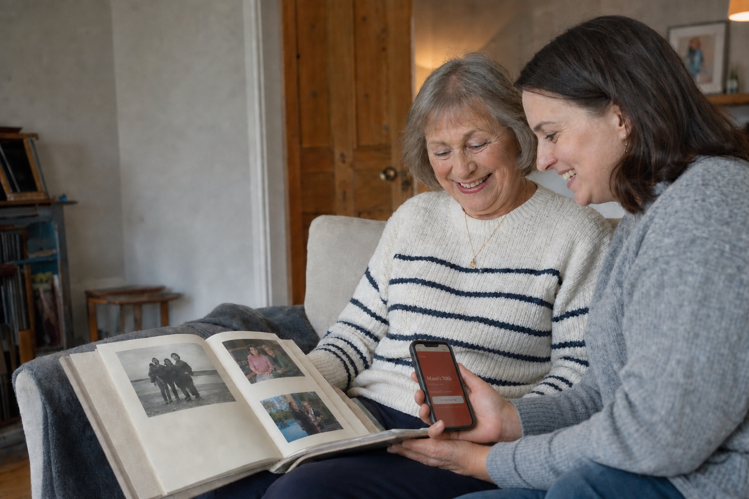 A mother and her daughter sitting together looking through their Chorus book, with the recordings playing from a phone